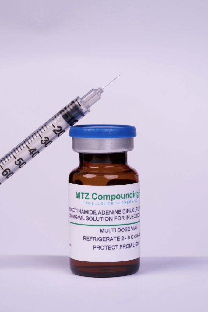 Syringe and vial of MTZ Compound for testing.